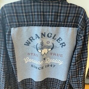 Upcycled flannel with Wrangler tee patch
